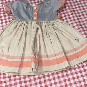 Well dressed wolf Shawn Elizabeth 12m